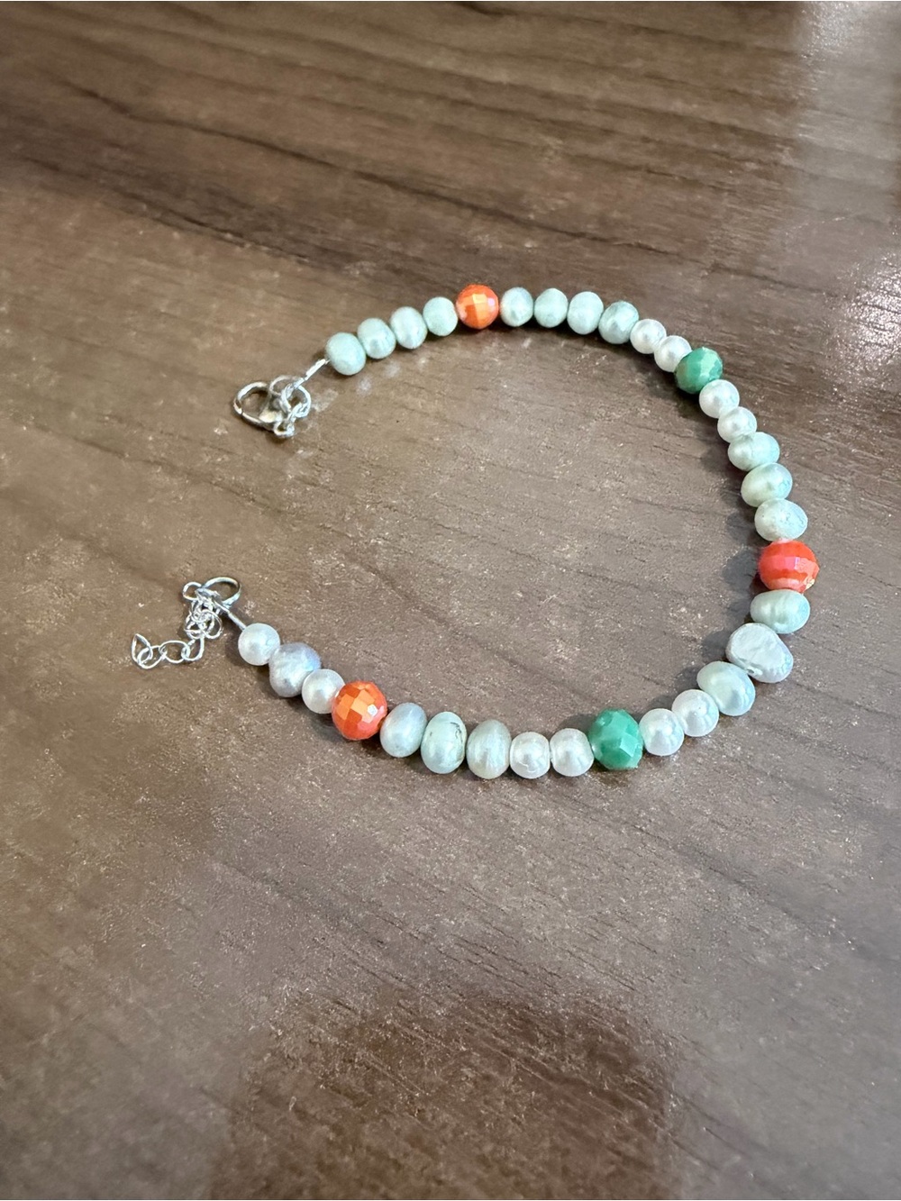 Pearl and Bead Bracelet with Orange and Green Accents